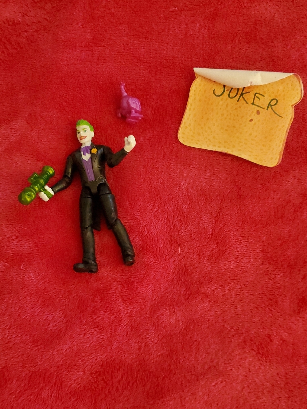 Spin Master DC Joker Action Figure with Green Hair and Purple Outfit